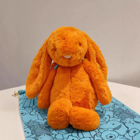 Boneka Kelinci Jellcatt UK Warna Oranye Cerah, Boneka Kelinci Telinga Lembut dan Melengkung dengan Pita Biru Muda