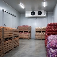 Chambre froide multi-compartiments pour le stockage d'aliments réfrigérés et congelés et la distribution en chaîne du froid