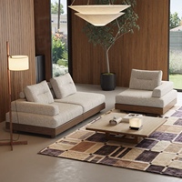 Canapé modulaire en chenille et bois massif pour salon d'appartement et d'hôtel, style moderne et minimaliste, librement combinable, avec table d'appoint amovible et lavable