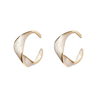 2025 boucles d'oreilles en gros en cristal pour femmes 2021 boucles d'oreilles torsadées plaquées or