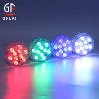 Producto de luz de piscina LED subacuática impermeable IR 24 teclas 16 colores con pilas Puck luces LED sumergibles con control remoto