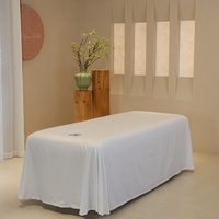 Jupe de lit blanche pour table de massage de salon de beauté, drap de lit doux pour la peau, housse de lit de massage SPA, couverture complète Sabnanas avec trou