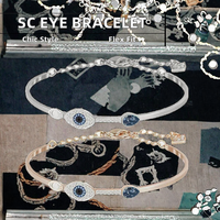 Bracelet ajustable en alliage SC « L'Œil de Dieu » avec placage or rose et strass bleus pour femme