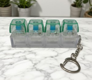 Porte-clés Fidget LED avec impression UV personnalisé<span class=keywords><strong>e</strong></span>, design de touches de clavier Anime, jouet anti-stress à clic pour clavier - Product Image 6
