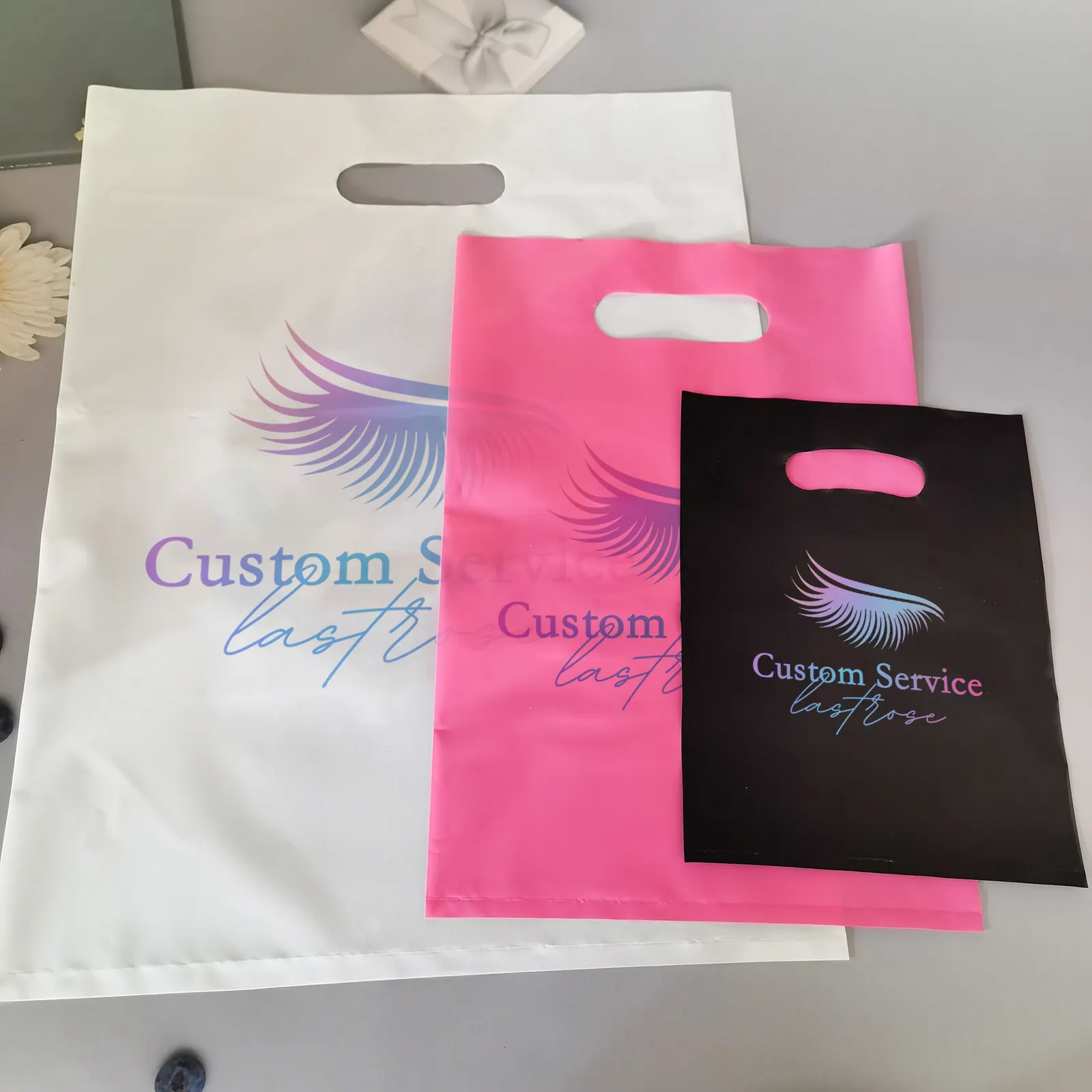 custom logo printed handle plastic shopping bags,private label clothes gifts cosmetics packaging plastic storage bag