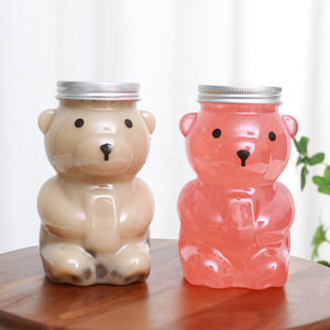 Venta caliente Forma de oso PET Botella de agua de plástico Tapa de aluminio Bebidas Jugo Café Leche Soda Con tapón de rosca Vestido frío - Product Image 1