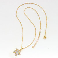 Ensemble collier et bague réglable anti-anxiété relaxant pour femme, avec pendentif moulin à vent rotatif en zircon étincelant incrusté de cuivre
