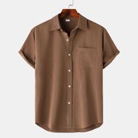 Kemeja Pria Lengan Pendek Kancing Satu Dada Kerah Turun Warna Solid Edisi Longgar Gaya Kasual Pewarnaan Garment Dyed Musim Panas Terlaris