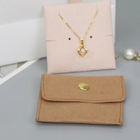 Pochette à bijoux en microfibre légère et tendance avec logo personnalisé, bouton-pression, faite à la main pour boucles d'oreilles, colliers et bagues – Vente en gros