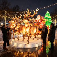 Grandes décorations lumineuses de Noël en forme de traîneau et de rennes, lanternes de carrosse du Père Noël pour les expositions extérieures de fêtes de fin d'année