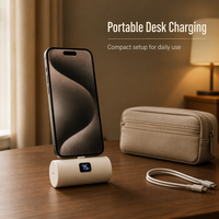 Mini batterie externe portable avec câble de charge intégré et écran LED numérique pour smartphone, idéale pour une utilisation quotidienne en poche