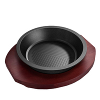 Grosir Besi Cor Bentuk Bulat Sizzling Pan Fajita Pan Besi Cor Pan dengan Nampan Kayu Penggunaan Ganda