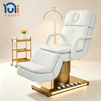 Table de massage électrique inclinable pour soins du visage avec tabouret, base dorée, pour spa, salon de beauté et clinique esthétique