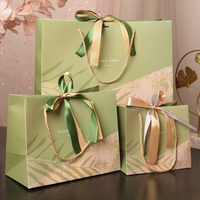 Sacs cadeaux classiques en papier végétal vert matcha, personnalisables, recyclables, résistants à l'humidité et imperméables, avec cordon de serrage en ruban, motif feuille de palmier simple