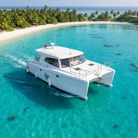 Yacht catamaran à deux coques de 11,6 m, bateau à moteur en FRP, cabine fermée, diesel, navire côtier