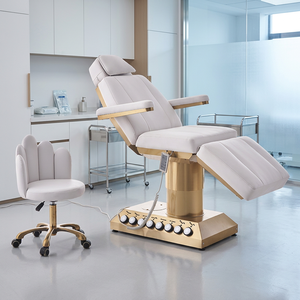Cama de Belleza Eléctrica Multifuncional con Base Dorada, Tapicería de Cuero PVC y Esponja 4D, Silla para Tratamientos Faciales, Cama de Masaje para Spa - Product Image 1