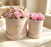 Boîtes à fleurs et à roses de luxe de forme ronde en matériaux recyclés avec couvercles, laminage mat et gaufrage