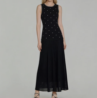Robe longue en tricot uni à col rond sans manches à ourlet plissé de style français pour femme, tenue décontractée de luxe avec perles, 2026