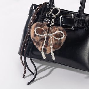 Sac d'amour en peluche <span class=keywords><strong>à</strong></span> imprimé léopard créatif pendentif Senior Sense <span class=keywords><strong>bricolage</strong></span> corde boule de <span class=keywords><strong>laine</strong></span> porte-clés amour délicat ornements suspendus - Product Image 3