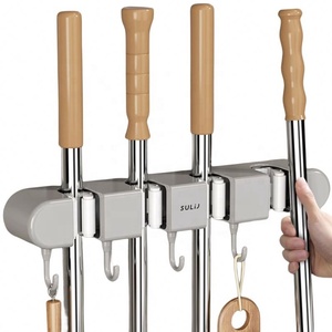 Estante de almacenamiento de plástico para baño de fábrica, gancho de fregona de goma suave, hebilla sin costuras, estante montado en la pared, Clip para estante de fregona - Product Image 1