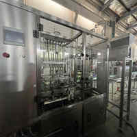 Machine de remplissage automatique de liquides linéaire électrique de 5 litres pour bouteilles PET de 5L à 10L dans la ligne de production chimique et de produits manufacturés