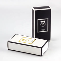 Conception personnalisée de luxe boîte d'emballage cosmétique en papier pour bouteille d'huile essentielle de parfum en relief en or