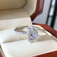 Alta calidad 1CT 1.5CT 2CT 3CT 4CT 18K oro corte redondo Moissanite bisel anillo mujeres Vvs diamante solitario anillo de compromiso joyería