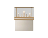Vitrine de présentation de bijoux de luxe à prix d'usine avec éclairage LED, en acier inoxydable, taille et couleur personnalisables pour les magasins de détail