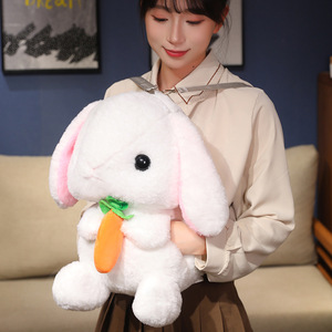 หมอนอุ่นมือรูปกระต่ายน่ารัก ตุ๊กตาขนนุ่ม กระเป๋าเป้ ตุ๊กตา ของขวัญวันเกิดสำหรับเด็กผู้หญิง - Product Image 1