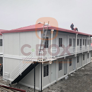 Casa Contenedor Modificada de 2 Pisos con Balcón y Escalera en Espiral para Uso Residencial - Product Image 2
