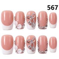 1331-1335 Faux ongles ronds faits à la main à presser, 10 pièces, style français, faux ongles 3D avec sculpture, haute qualité pour doigts