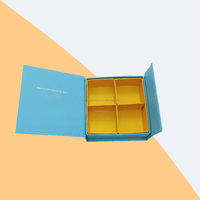 Caja de calendario de Adviento de cartón de lujo personalizada Embalaje de regalo de papel en relieve con revestimiento UV vacío para cosméticos de belleza Cuenta regresiva