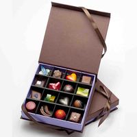 Carton rigide noir avec logo personnalisé Emballage de boîte cadeau en papier magnétique pour chocolat truffe Doublure en éponge Impression par stratification mate