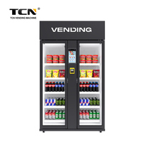 Distributeur automatique intelligent TCN AI de 1074 L pour aliments frais, collations et boissons, avec paiement par carte, fonctionnement 24h/24 et 7j/7, et fonctions visuelles.