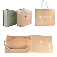 Caja de regalo de papel de ropa con imán plegable, caja de regalo magnética de embalaje de barco plano, caja plegable con cinta de transporte