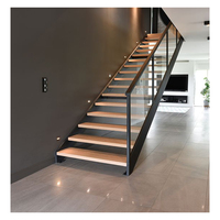 Escalier intérieur moderne en acier et bois à poutre centrale dissimulée avec garde-corps en verre – Écologique et durable, fixation par boulons