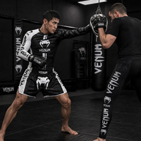 Ensemble MMA 3 pièces : Rashguard à manches longues, short de combat et pantalon de compression à empiècements blancs. Logo personnalisé, OEM, ODM, faible MOQ, directement de l'usine.