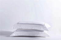 Ensemble de draps de lit personnalisés en satin de coton pur 300T broderie blanche literie de luxe motif solide refroidissement pour hôpital hôtel 4 pièces