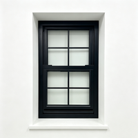 Ventana Corredera Vertical de Aluminio Negro de Fábrica con Rejilla y Vidrio Templado para Villa