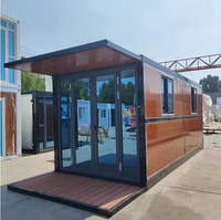 Maison conteneur pliable prête à être expédiée 	 Maison préfabriquée personnalisable et extensible de 20 pieds avec 2 chambres et cuisine pour l'investissement locatif