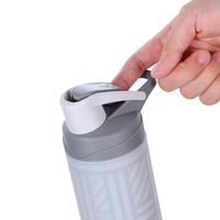 Fabricant Logo personnalisé Grande bouteille écologique en verre transparent coloré pour la boisson et le sport sans Bpa avec manchon en silicone