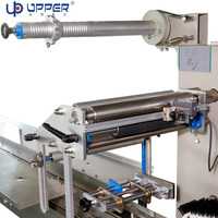 Machine d'emballage automatique pour croissants, mini-gâteaux, machine d'emballage alimentaire, machine d'emballage sous vide à coussin d'azote