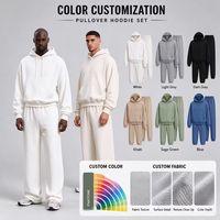 Ensemble de survêtement streetwear pour homme, coupe ample, en molleton de coton biologique, personnalisable OEM sous marque privée, comprenant un sweat à capuche et un pantalon de survêtement amples et unis