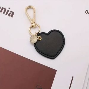 Wholesale Pu Leather Luxury Women Pendant Elegant Pretty Promotional Shaped Heart Keychain <b>Bag</b> <b>Charms</b> - Product Image 3
