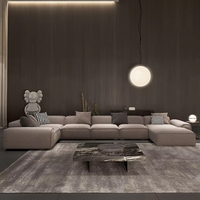 Ensemble de canapés modulaires en forme de L de style italien minimaliste avec cadre en bois, rembourrage en éponge et revêtement en tissu givré pour grand appartement