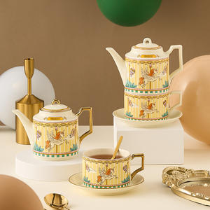 Service à thé en céramique, coffret cadeau carrousel, théière anglaise, tasses et soucoupes à café plaquées or - Product Image 2