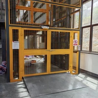 Monte-charge électrique à rail guidé, élévateur vertical hydraulique pour marchandises avec dispositif de sécurité pour le levage de marchandises en entrepôt intérieur
