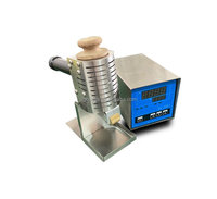 Machine de distribution de colle thermofusible pour le collage de cartons