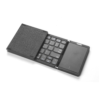 Clavier sans fil Bluetooth mini pliable en cuir pour ordinateur portable tablette Clavier portable pliable avec pavé tactile