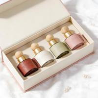 Diffuseur de parfum cylindrique de luxe en verre, avec étui en cuir personnalisé et bouchon en bois, contenant pour parfum d'intérieur